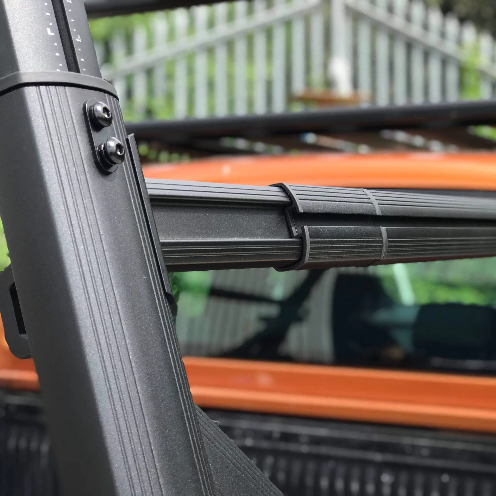 Adaptable Adjustable Cargo Rack fits with or without a Roll & Lock